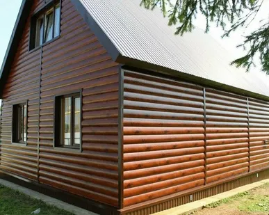фото Металлический сайдинг "Блок-хаус"