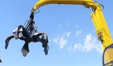 фото Колесный экскаватор с грейфером