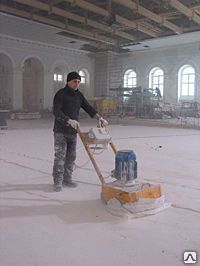 фото Шлифовка неровностей пола шлифовальной машиной