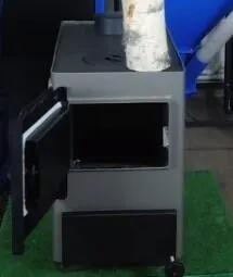 Фото №12 Котел на твердом топливе Каракан 20 ТПЭ 3, 20 кВт с плитой