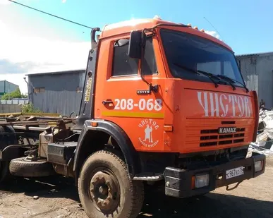 фото Вывоз мусора контейнером