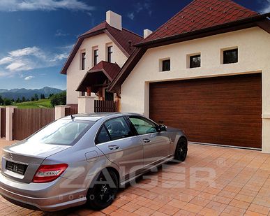 фото Секционные подъемные ворота Zaiger