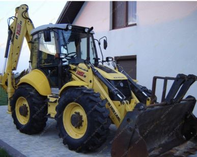 фото Аренда экскаватора-погрузчика New Holland B115, Сочи