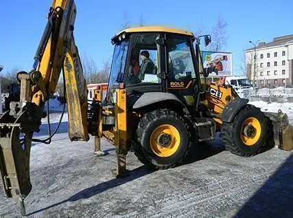 Фото №0 Экскаватор погрузчик с гидромолотом