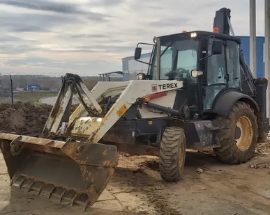 фото Аренда экскаватора-погрузчика с гидромолотом в Туле