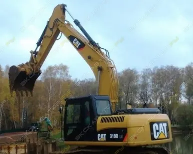 фото Аренда гусеничного экскаватора Caterpillar 319C, Москва