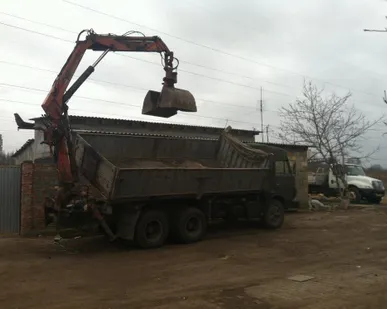 фото Вывоз строительного мусора. Грейфер