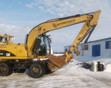 фото Аренда колесного экскаватора Caterpillar M315D, Салехард