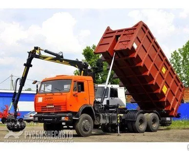 фото КМУ Ломовоз КамАЗ-65115-773094-42 (Евро 4),кузов 30 куб.,ОМТЛ-97-06, захват
