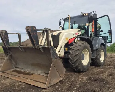 фото Аренда экскаватора-погрузчика Terex TLB 990