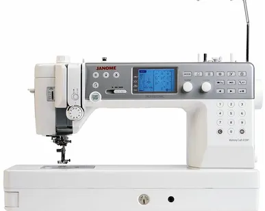 фото Швейная машина Janome Memory Craft 6700P, белый