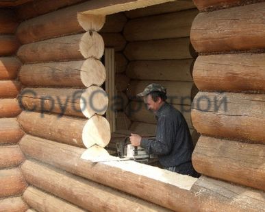 фото Выпиливание проема в срубе