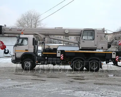 фото КС-55729-4B автокран 32т. Volvo FM стрела ОВОИД 30,2м.