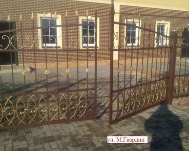 фото Забор кованый