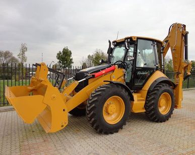фото Экскаватор погрузчик CAT 434
