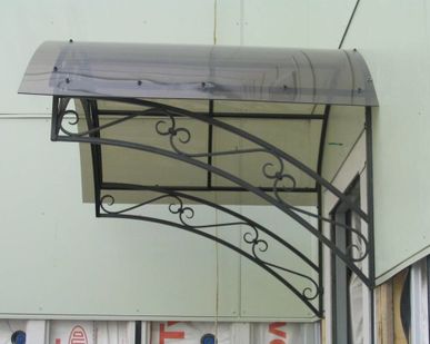 фото Козырьки из поликарбоната, в т.ч кованные