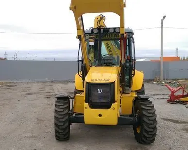 фото Экскаватор-погрузчик New Holland B90B