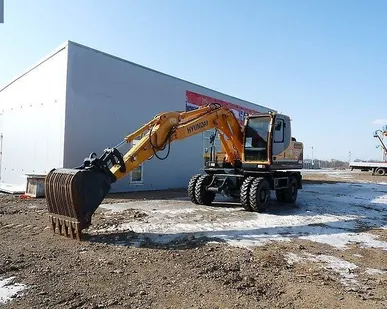 фото Экскаватор Hyundai R140W-7