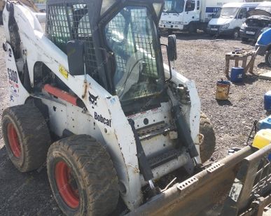 фото Аренда мини-погрузчика Bobcat S300, Гатчина