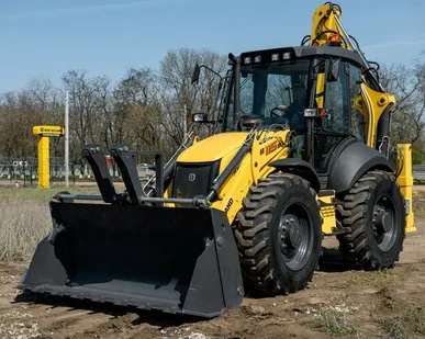 фото Экскаватор погрузчик New Holland 115 в аренду