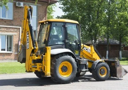 Фото №0 Строительный экскаватор-погрузчик KOMATSU WB70A-1