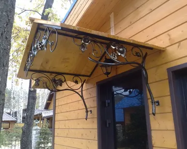 фото Кованые козырьки