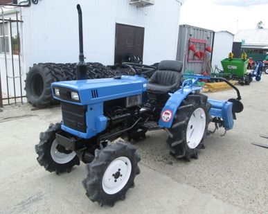 фото Японский
мини трактор ISEKI TX1500F