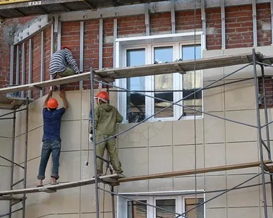 фото Облицовка стен фасадов керамогранитом по металлическому каркасу