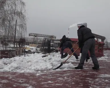 фото Убираем снег с крыш