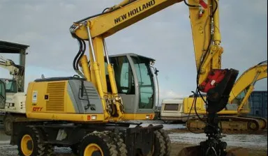 фото Колесный грейфер New Holland MH CITY