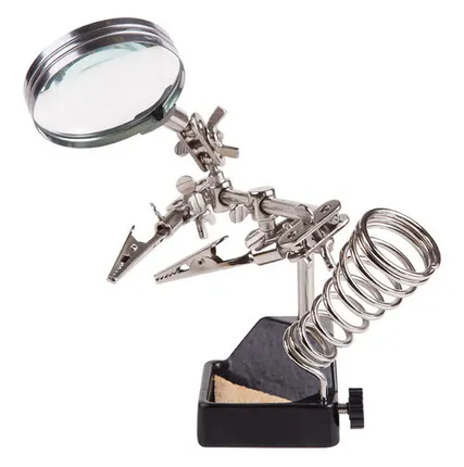 Фото №0 Держатель Третья рука, 2 зажима, лупа 60мм (2.5х), подставка паяльника, ниша, губка, чугун REXANT