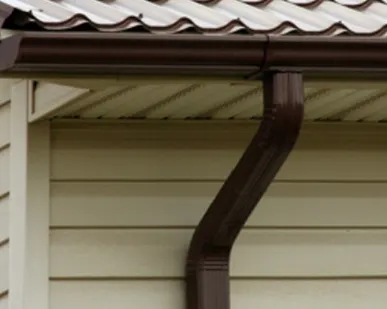 фото Колено трубы водосточной