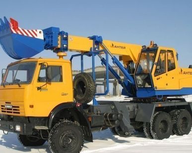 фото Авто экскаватор погрузчик