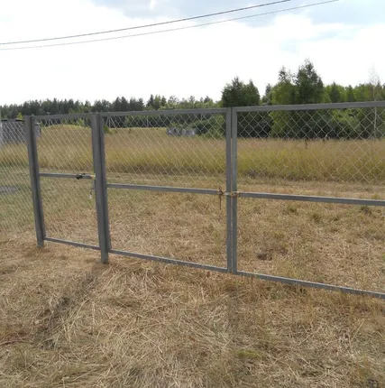 Фото №0 Ворота с калиткой затянутые сеткой рабицей 1,5х4 м.