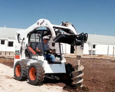 фото Бурение грунта под столбы