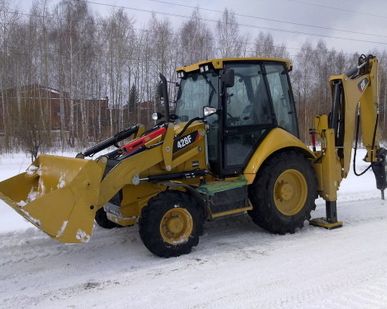 фото Экскаватор в аренду CAT 428