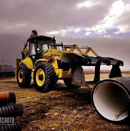 Фото №0 Экскаватор-погрузчик New Holland B115B