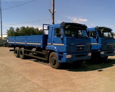 фото Бортовой КАМАЗ 65117-6052-23(А4) с тентом 2014г.