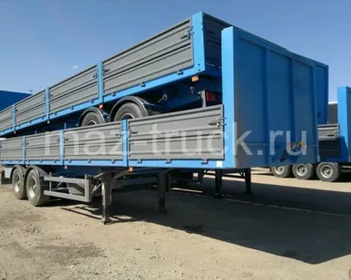 фото Полуприцеп бортовой МАЗ 938660-044