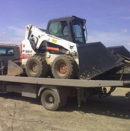 Фото №0 Перевозка минипогрузчика на эвакуаторе