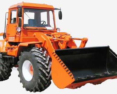 фото Трактор ХТА-220-02М с погрузочным оборудованием