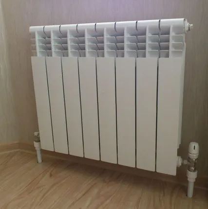 Фото №0 Монтаж и обвязка радиаторов отопления и напольных конвекторов в коттеджах