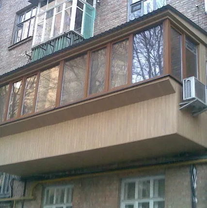 Фото №0 Остекление фасада балконов