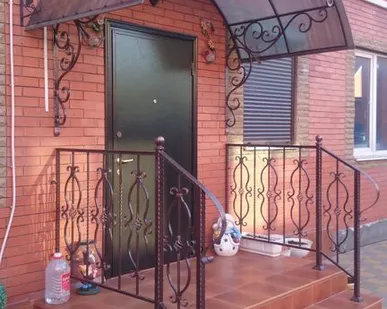 фото Козырек кованый