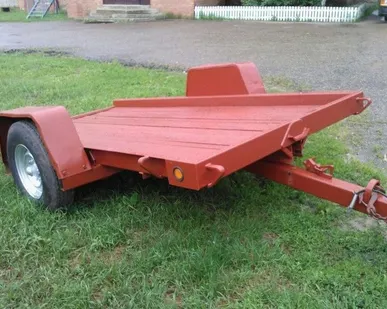 фото Прицеп низкорамный для перевозки ГНБ Ditch Witch