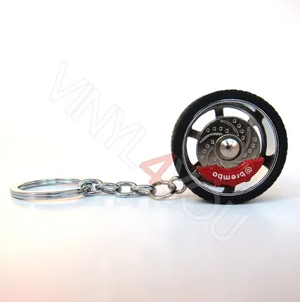 Фото №0 Брелок автомобильный с шиной серебро