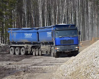 фото Сочлененный самосвальный автопоезд с боковой разгрузкой на правую сторону