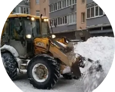 фото Уборка снега и его вывоз техникой