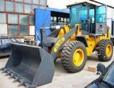 фото Фронтальный погрузчик TEREX TL100