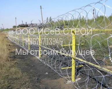 фото Барьер безопасности на забор